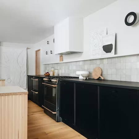 Cafe matte black appliances with Semihandmade cabinets