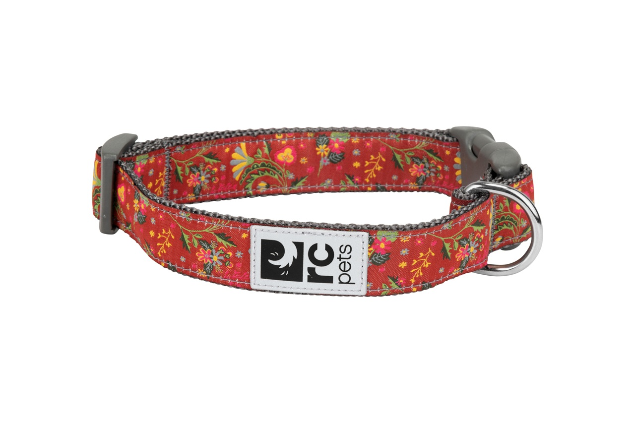 Red floral dog collar with a metal buckle and D-ring.