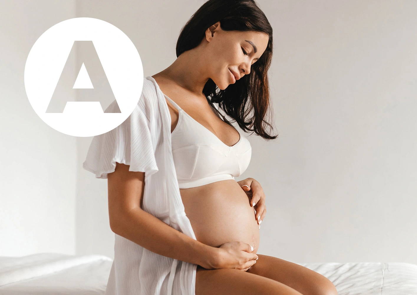 Letter A / Pregnant woman holding bump.