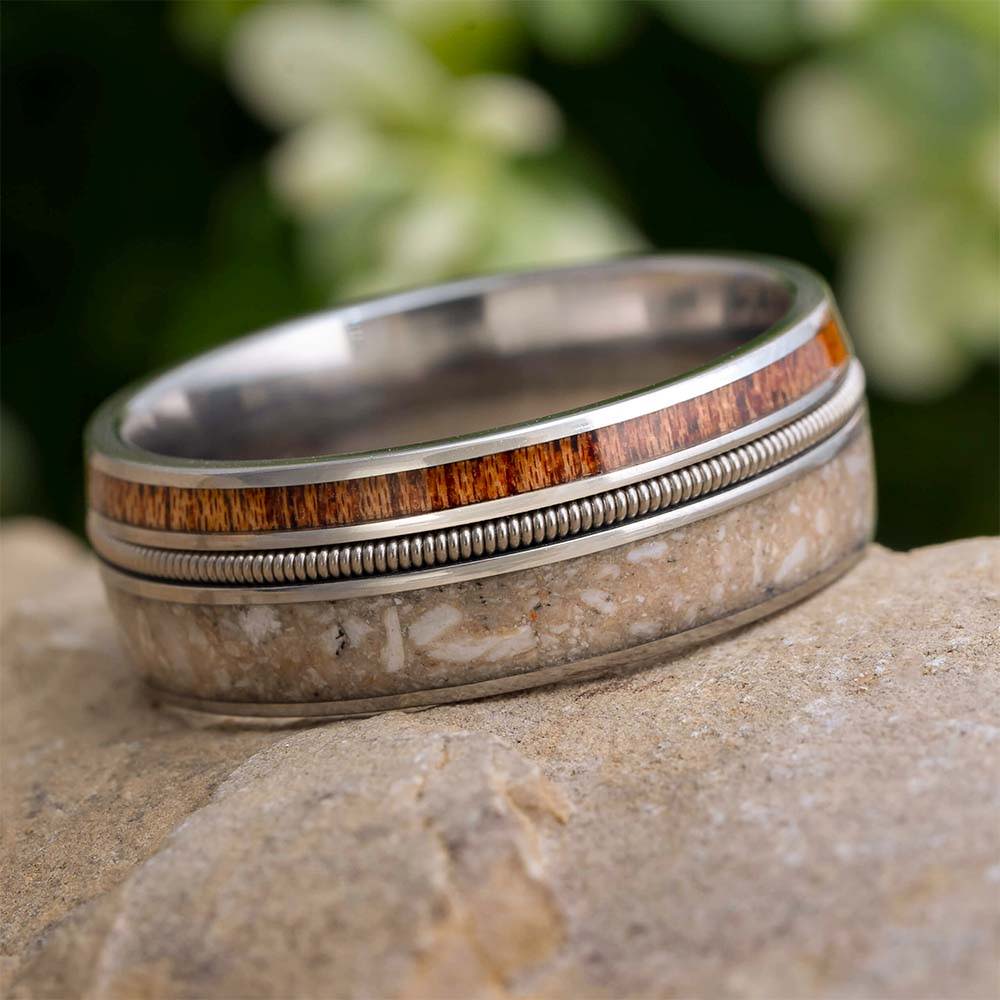 Cremation memorial ring for musician with guitar string