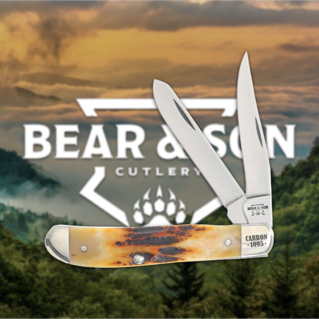 Knife displayed with Bear & Son Cutlery logo and mountain background.
