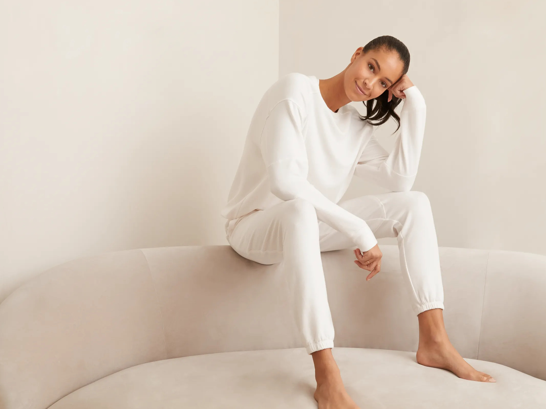 Shop Luxe Lounge. Photo Featuring  our Off Duty Sweatpant and Blocked Crewneck in Bone.