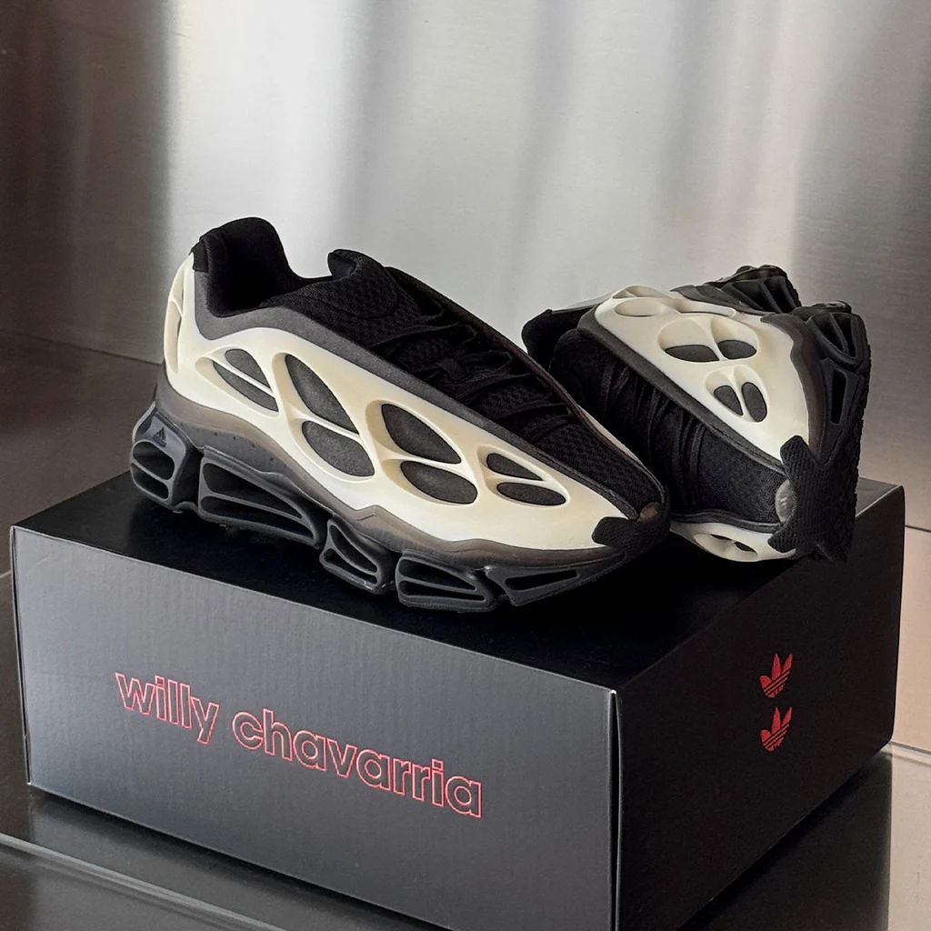 A pair of stylish sneakers on a branded box.