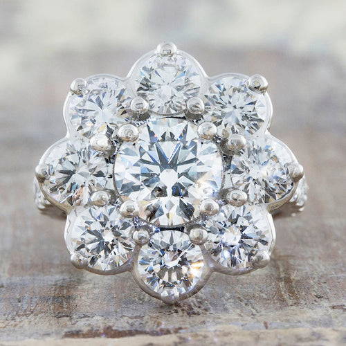 floral halo ring with button prong