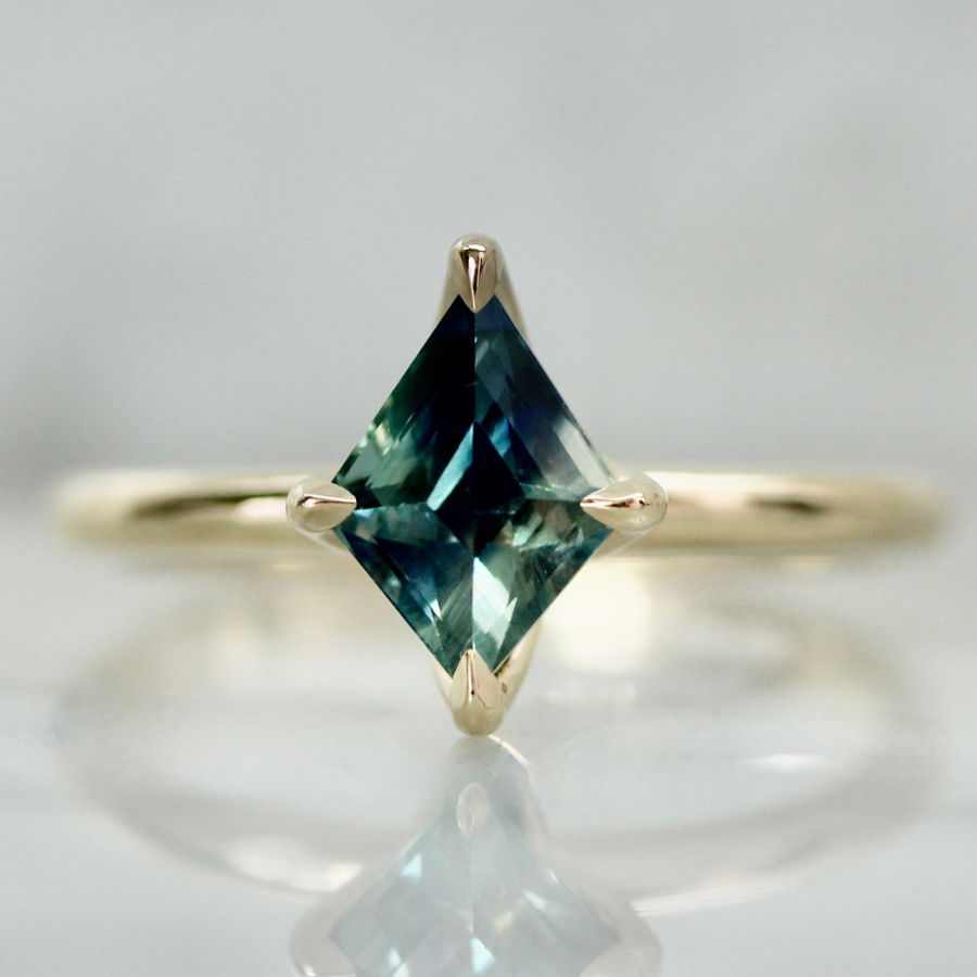 blue-green kite cut sapphire engagement ring
