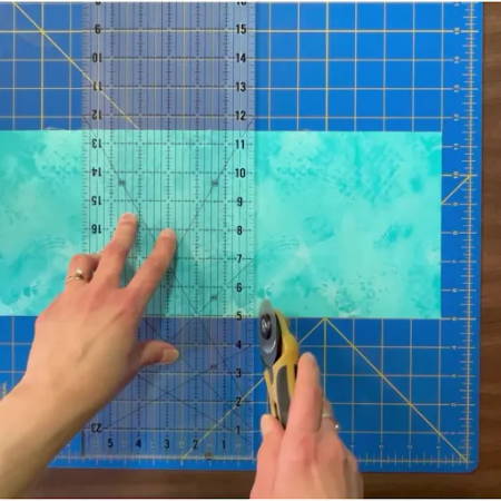 Cutting a 6 ½” square from a fabric strip