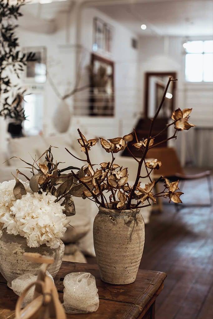 Dried flowers in rustic ceramic pot