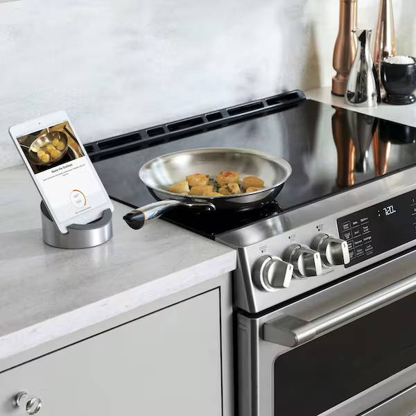 Induction range with pans on cooktop