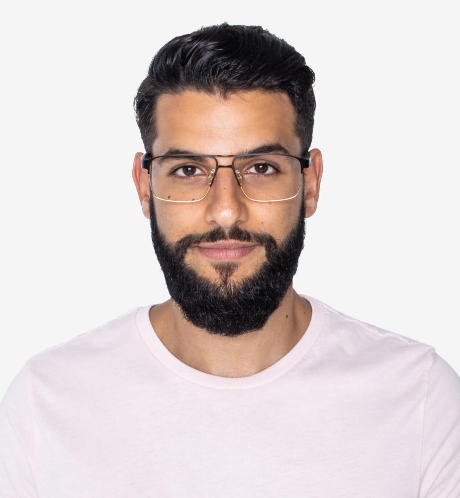 man wearing Euphoria Gold aviator low bridge glasses on a white background