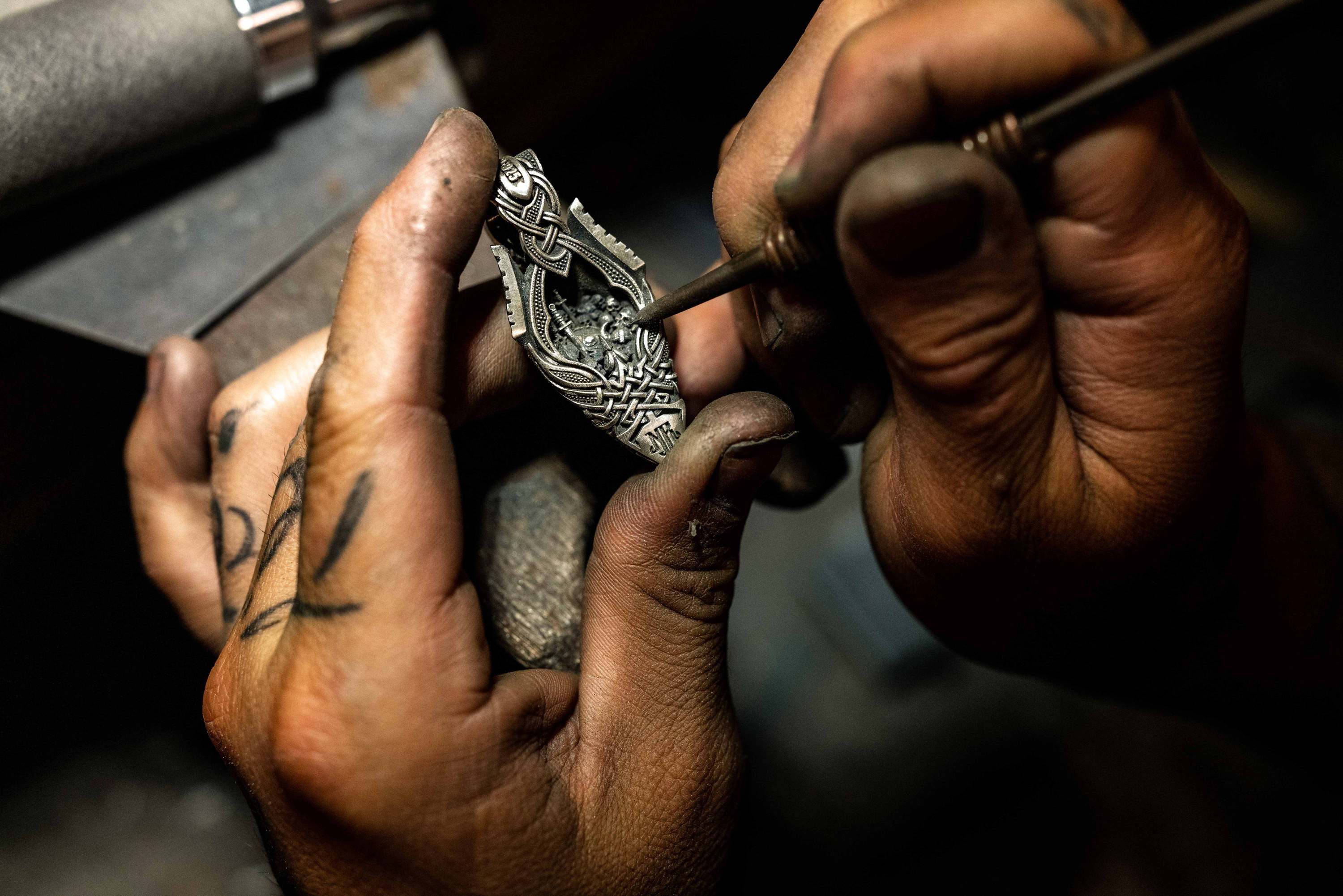 A NightRider Master Jeweler handcrafting the Valkyria Pendant