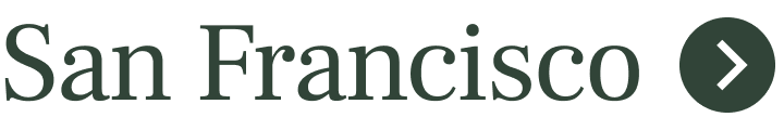 Text displaying 'San Francisco' with a right arrow icon.