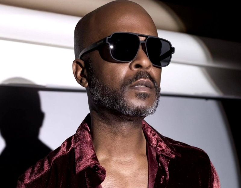 man styling Kraywoods' Parker aviator sunglasses with a burgundy velvet shirt