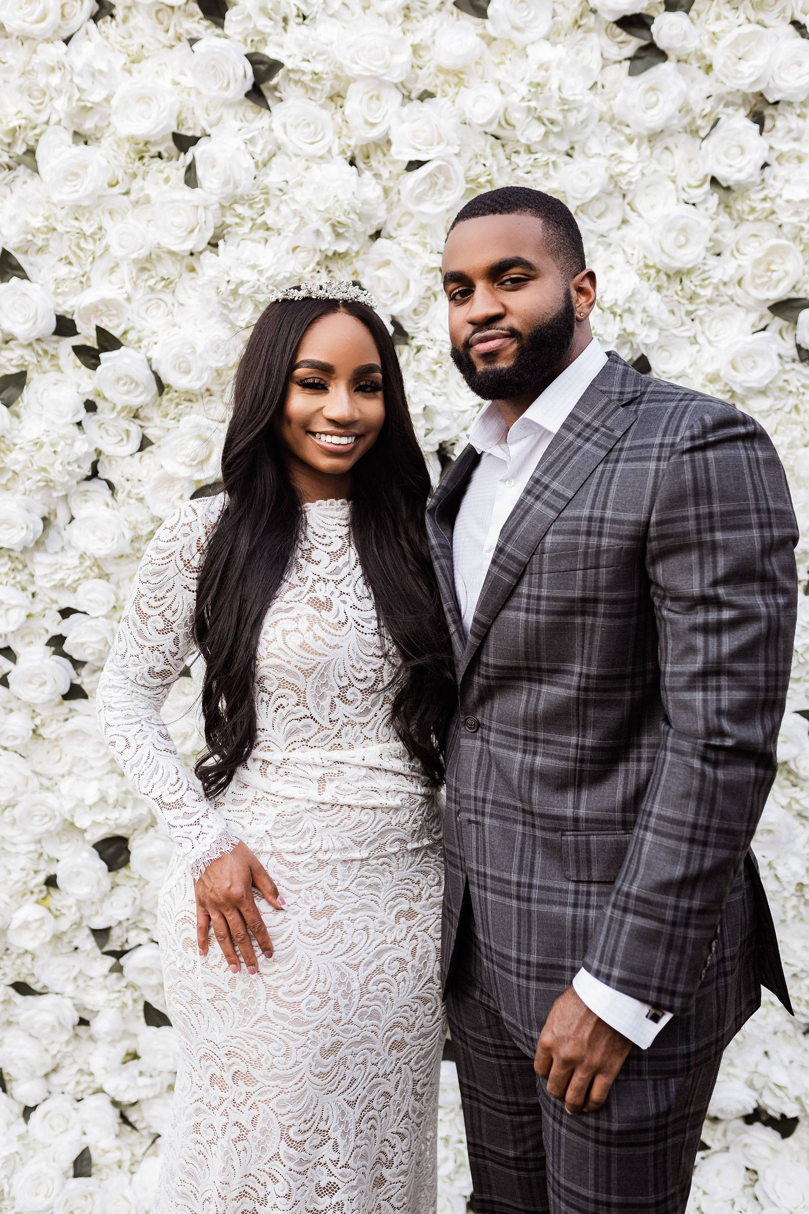 Bride wearing a long sleeve lace dress 