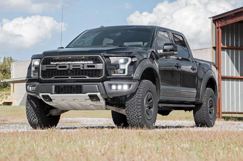 Black Lifted Ford Truck Outside