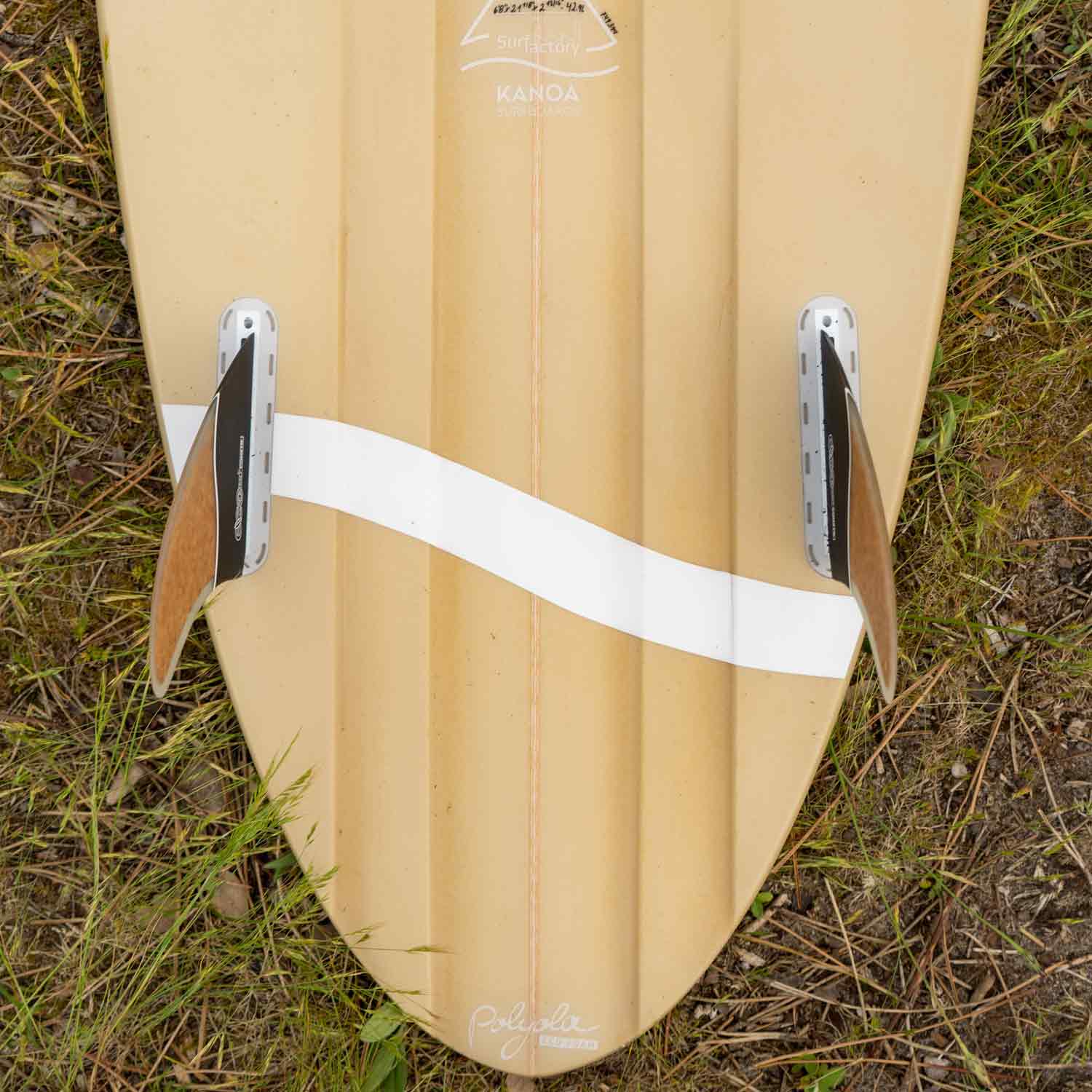 Performance Mid-Length Polyola Surfboard with sustainable construction and channels