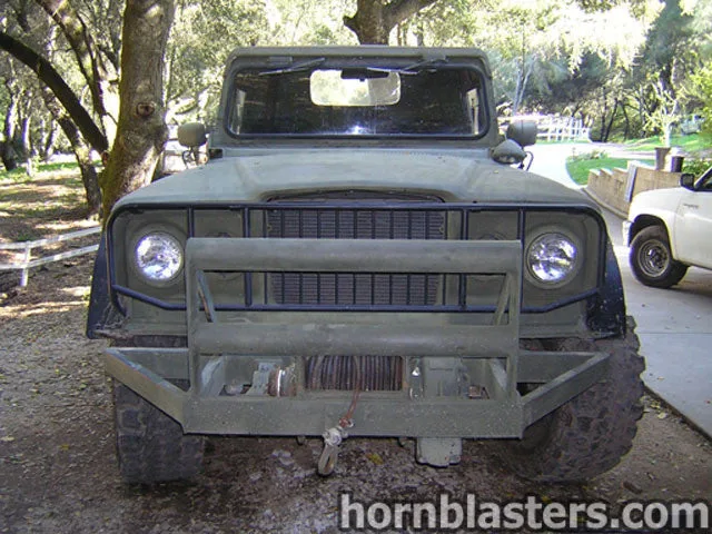 Side profile Scott's 1969 Jeep M715 pickup cargo bed wheels tires step bumper exterior Shocker XL horn gallery photo 2