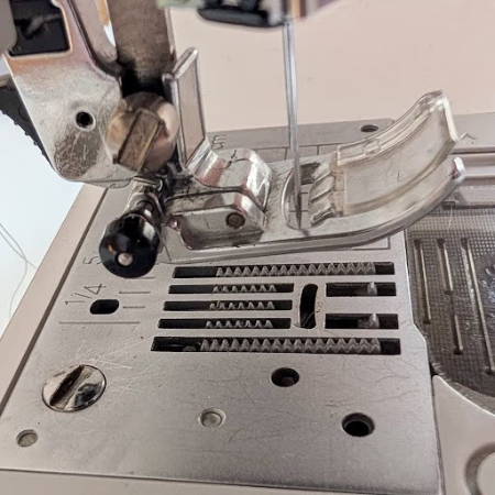 feed dogs of a sewing machine detail