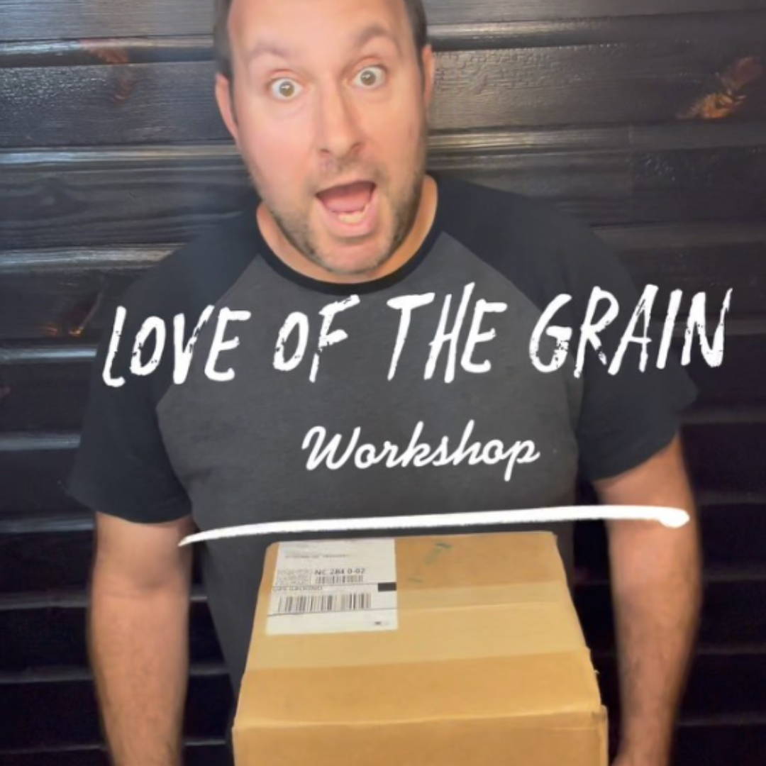 timothy schwartz from love of the grain workshop is holding a box of Promise Epoxy resin in his arms