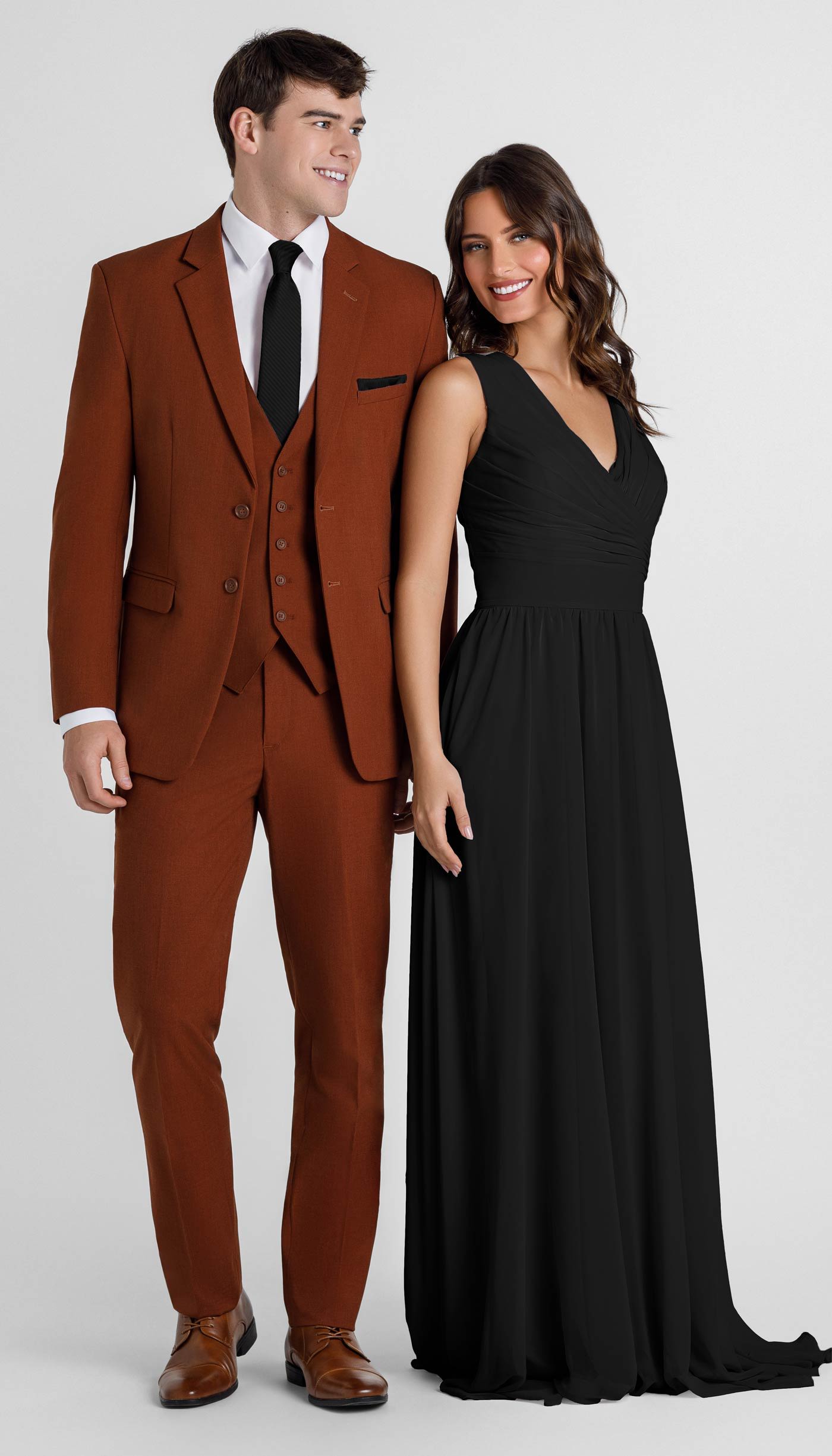 rust suit with black bridesmaid dress