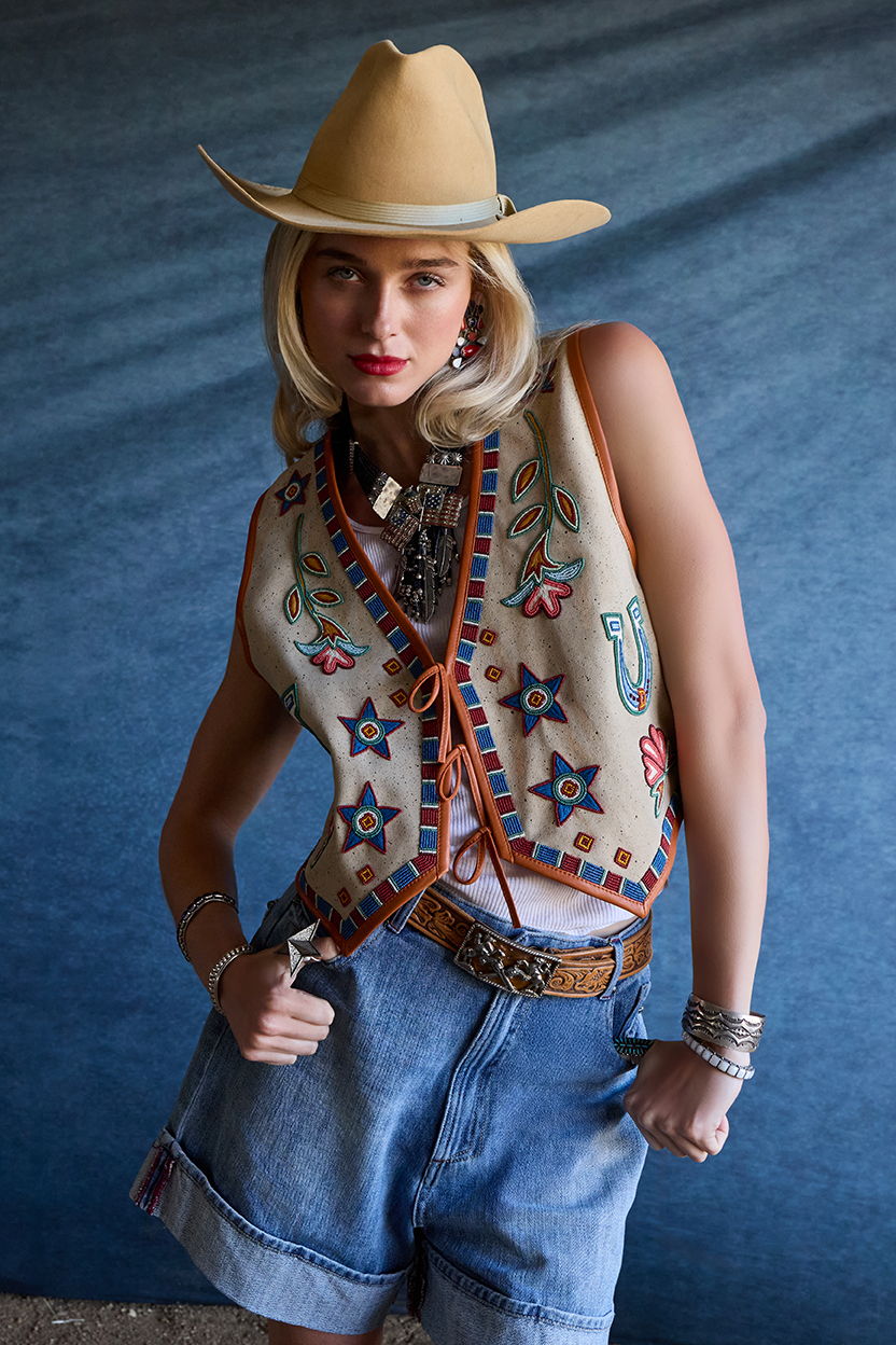 Haley wearing the Pursuit of Happiness vest with the Old Glory & Grit shorts paired with vintage Double D Ranch jewelry and accessories.