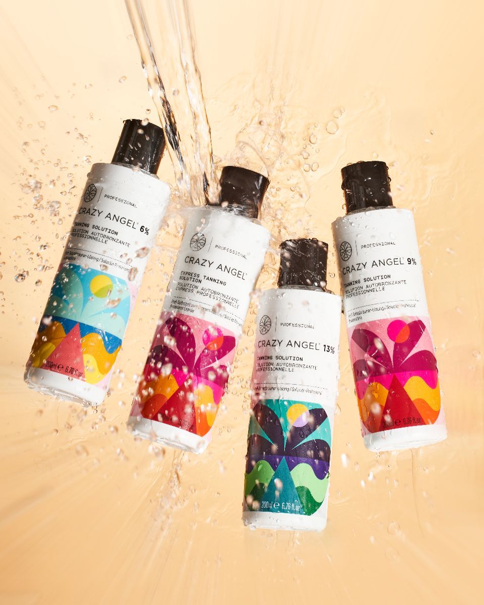 Four Crazy Angel spray tan solution bottles