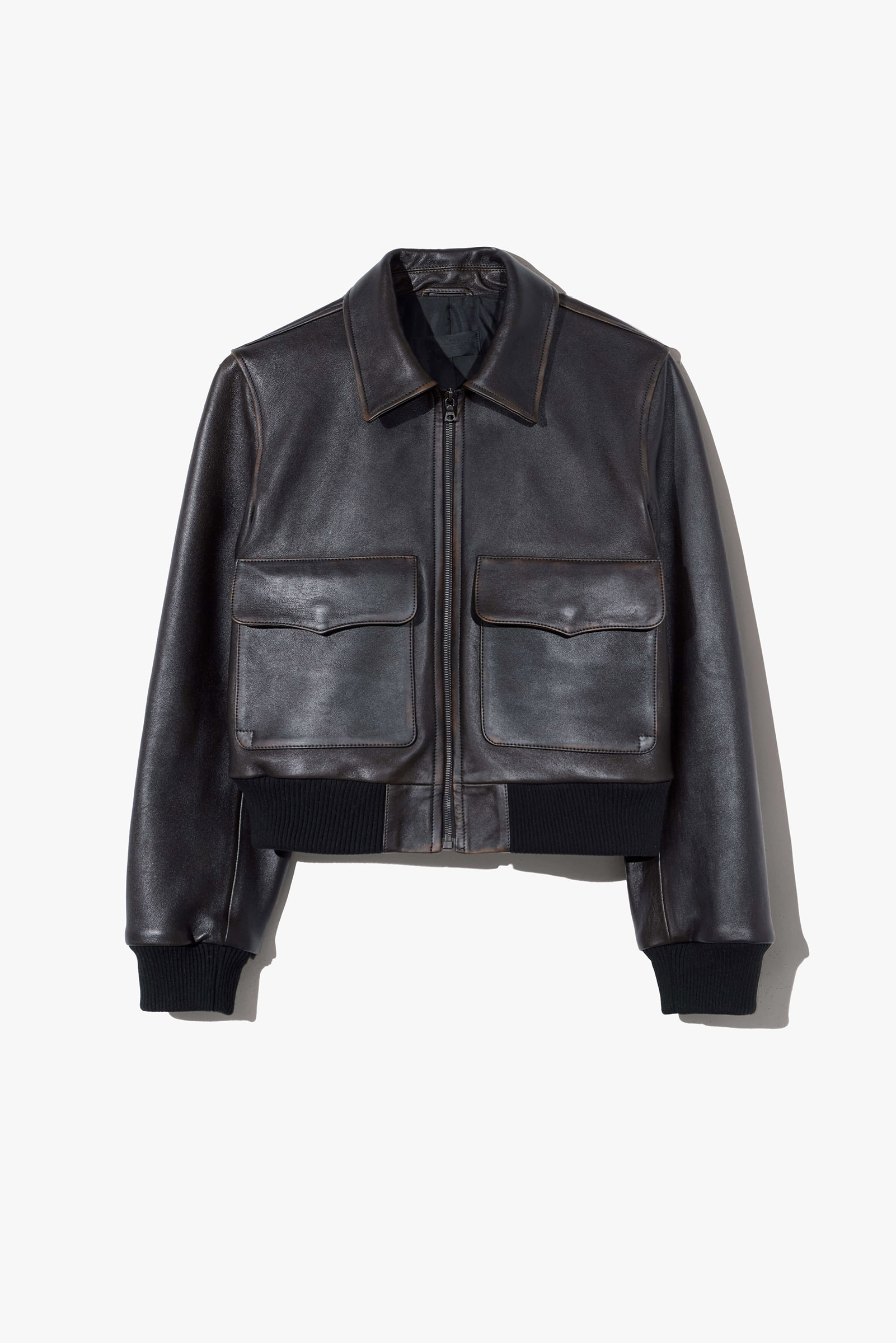 Black leather bomber jacket with two front pockets.