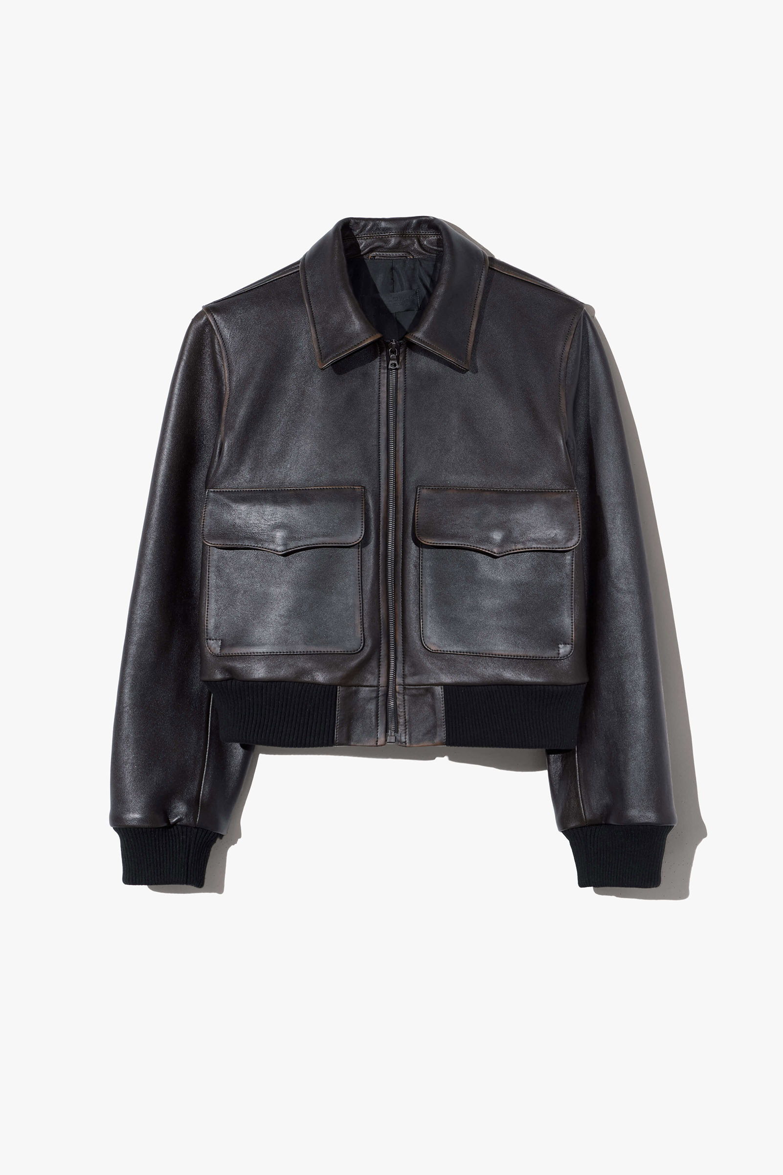 Black leather bomber jacket with two front pockets.