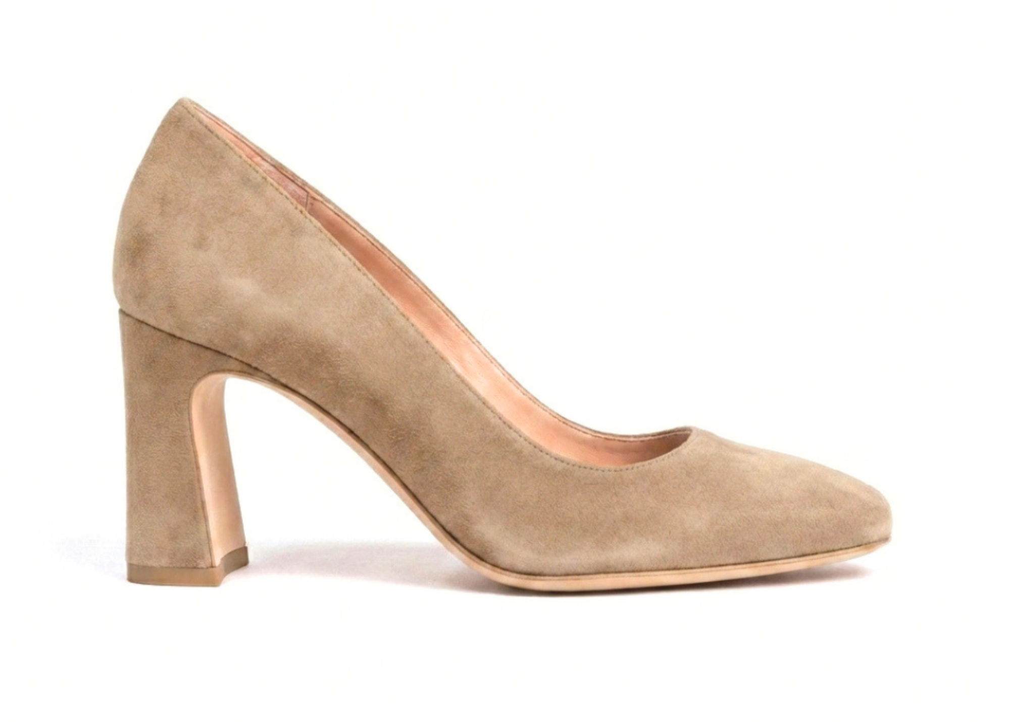 Beige suede high-heeled shoe with a chunky heel.
