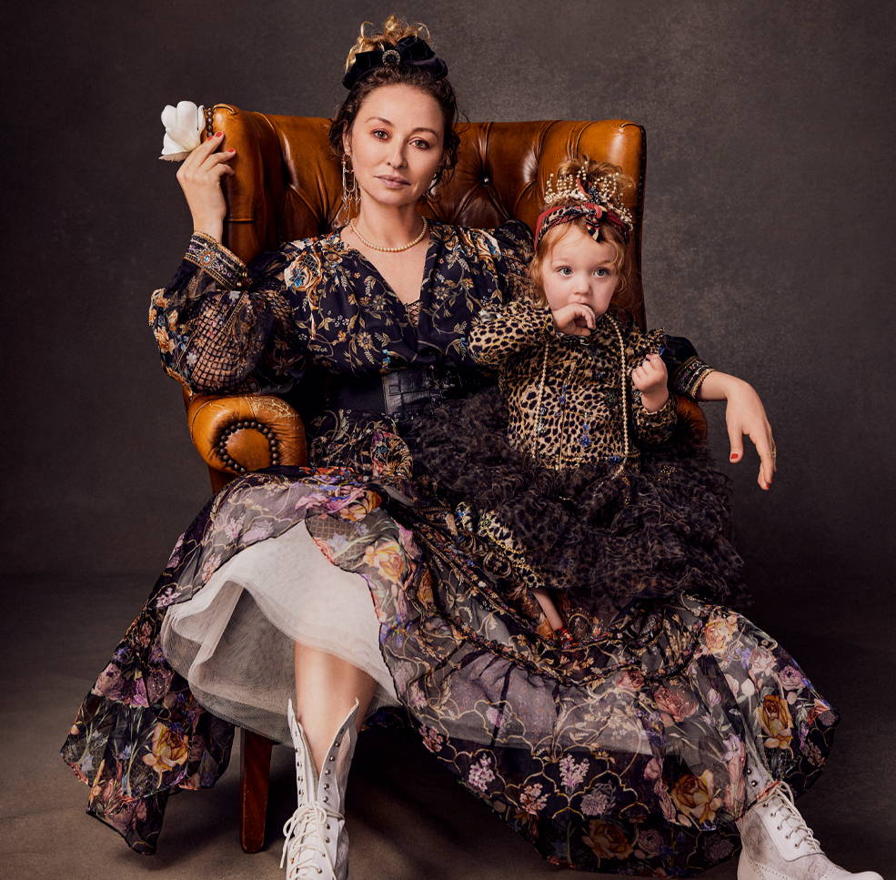 CAMILLA wearing Blushing Manor print with Luna on her lap