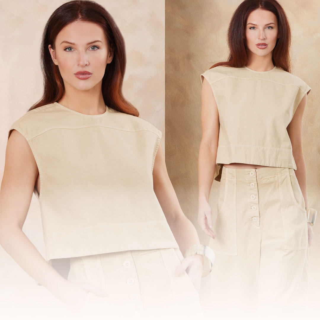 Model wearing a beige sleeveless top and matching pants against a neutral background.