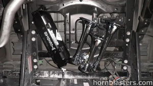 HornBlasters air tank and three chrome train horns installed on Wicked Customs's Ford F250 frame