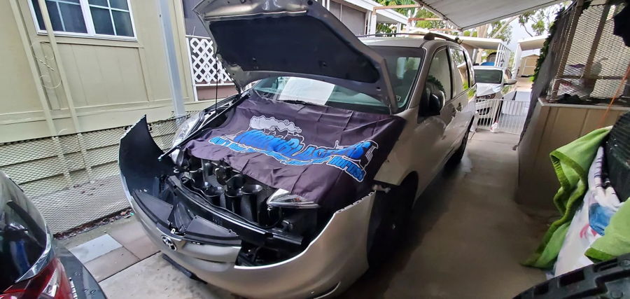 Silver Guillermo's 2007 Toyota Sienna hood open bumper removed black train horns radiator HornBlasters banner Conductor's Special 2HB featured customer install gallery photo 1