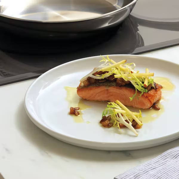 induction cooktop with salmon cooked with gourmet guided cooking