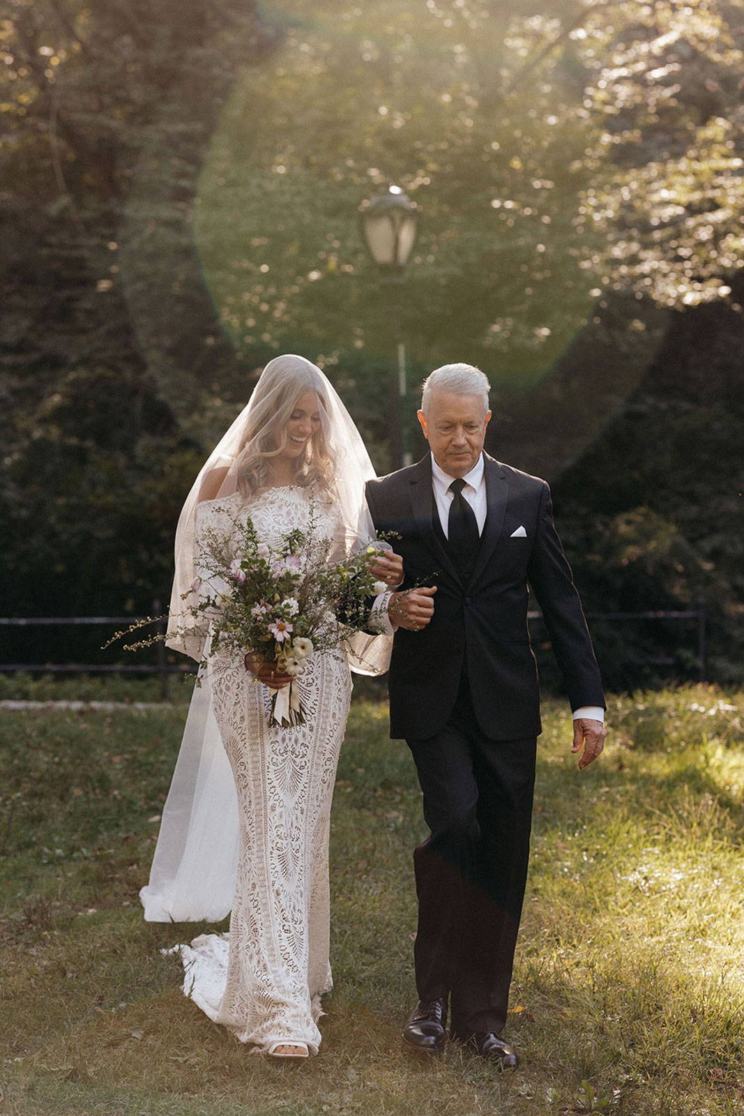 Bride walking down the isle with Family Member