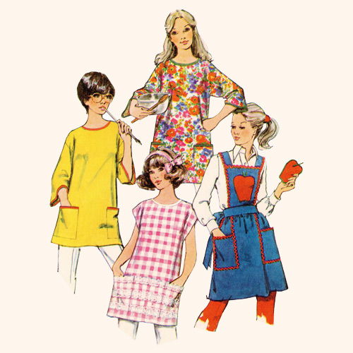 Four women modeling colorful vintage dresses and aprons from the 1970s.