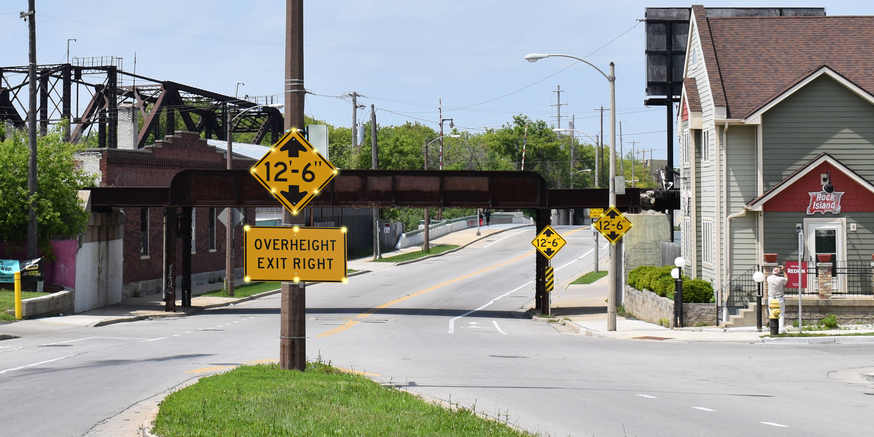 System-warning-driver-they-are-too-tall-for-bridge