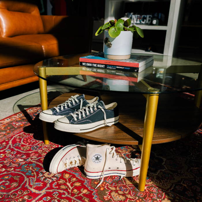 black and white converse in living room