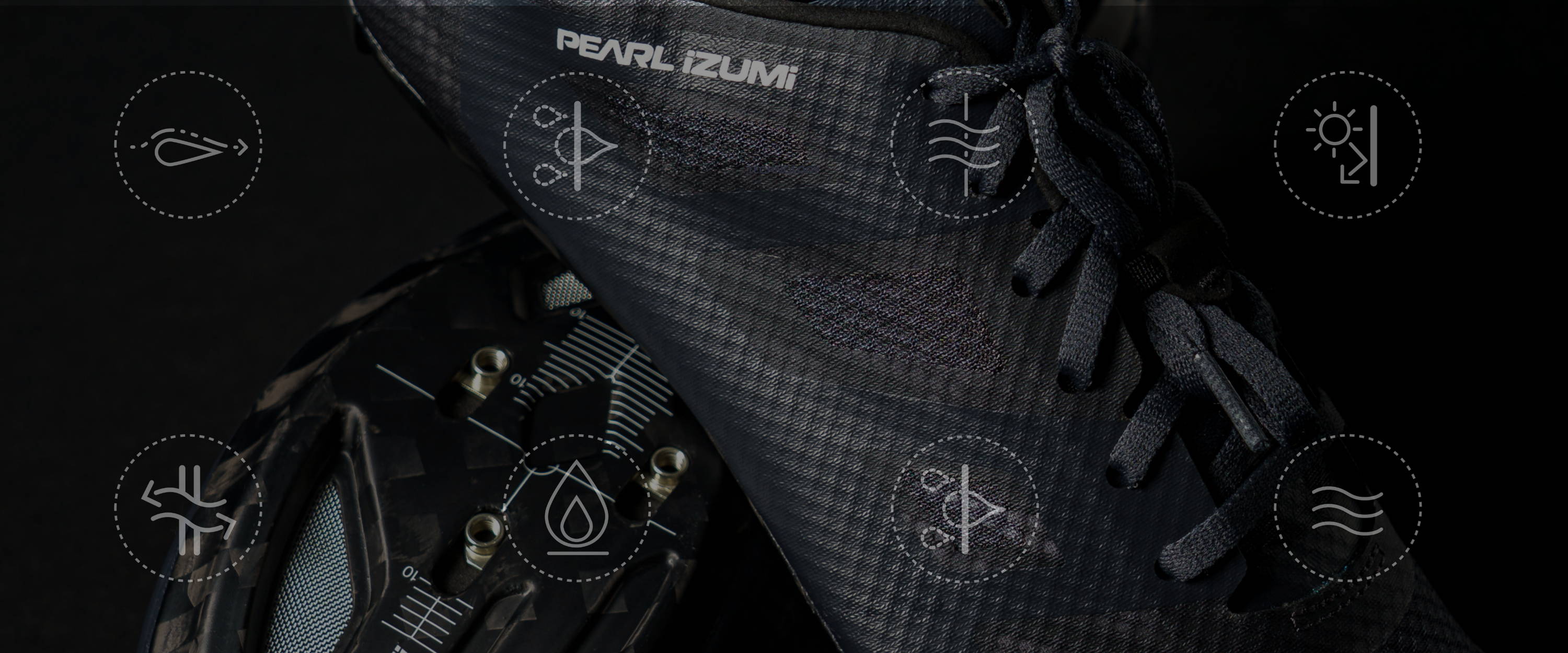 Close up shot of black PEARL iZUMi road cycling shoes with technology iconography overlays highlighting various technologies.