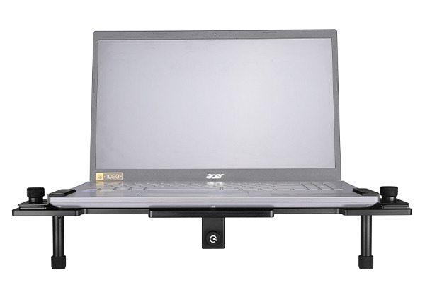 Laptop on a stand with adjustable height and stability.