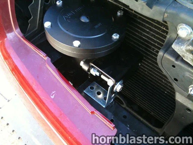 Close-up fitting and airline connection detail Nathan AirChime K3 on Frank's Nissan Maxima photo 14