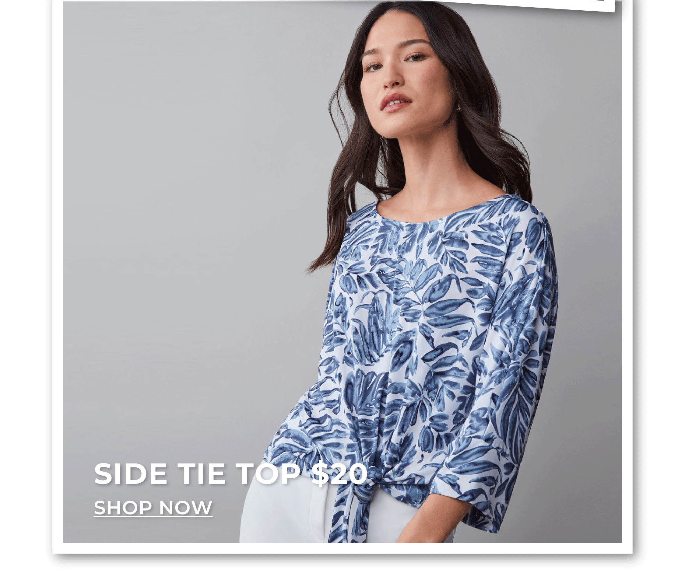 Woman in blue floral top. Side tie top $20.