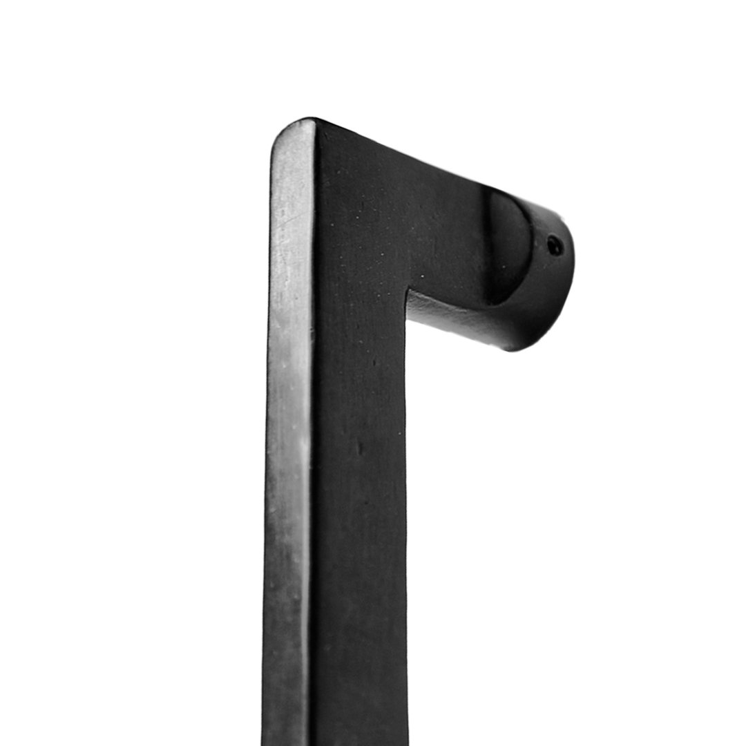 The Apollo solid bronze barn door handle by realcraft on a solid white background. 