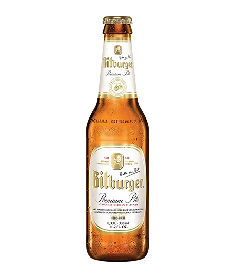 Bottle of Bitburger Premium Pils beer with a clear label design.