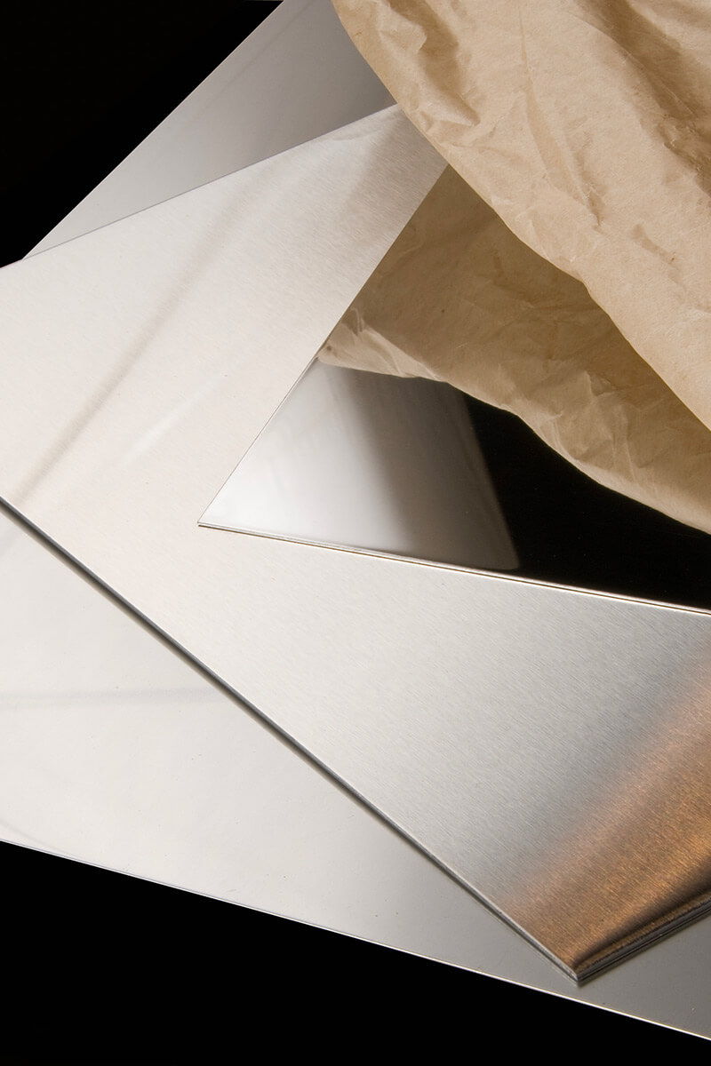 Stacked stainless steel sheets with brushed, polished and mill finishes