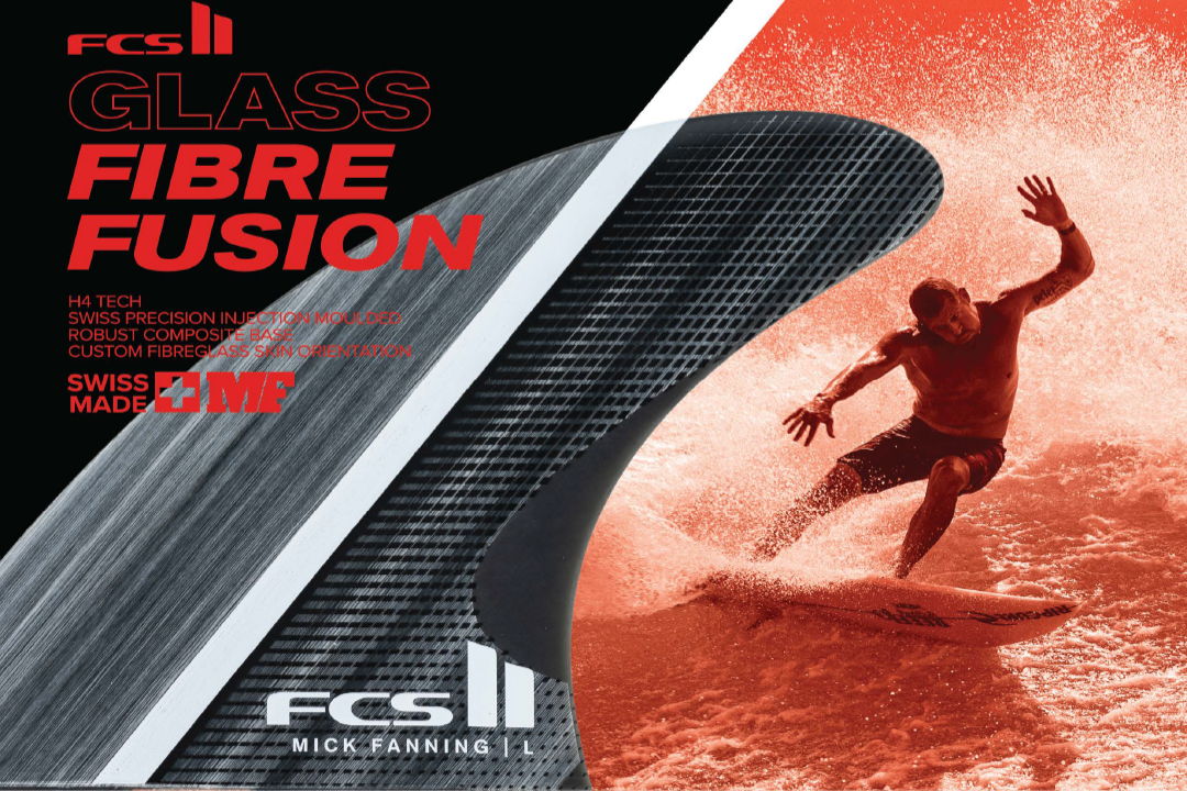 Surfer riding a wave with 