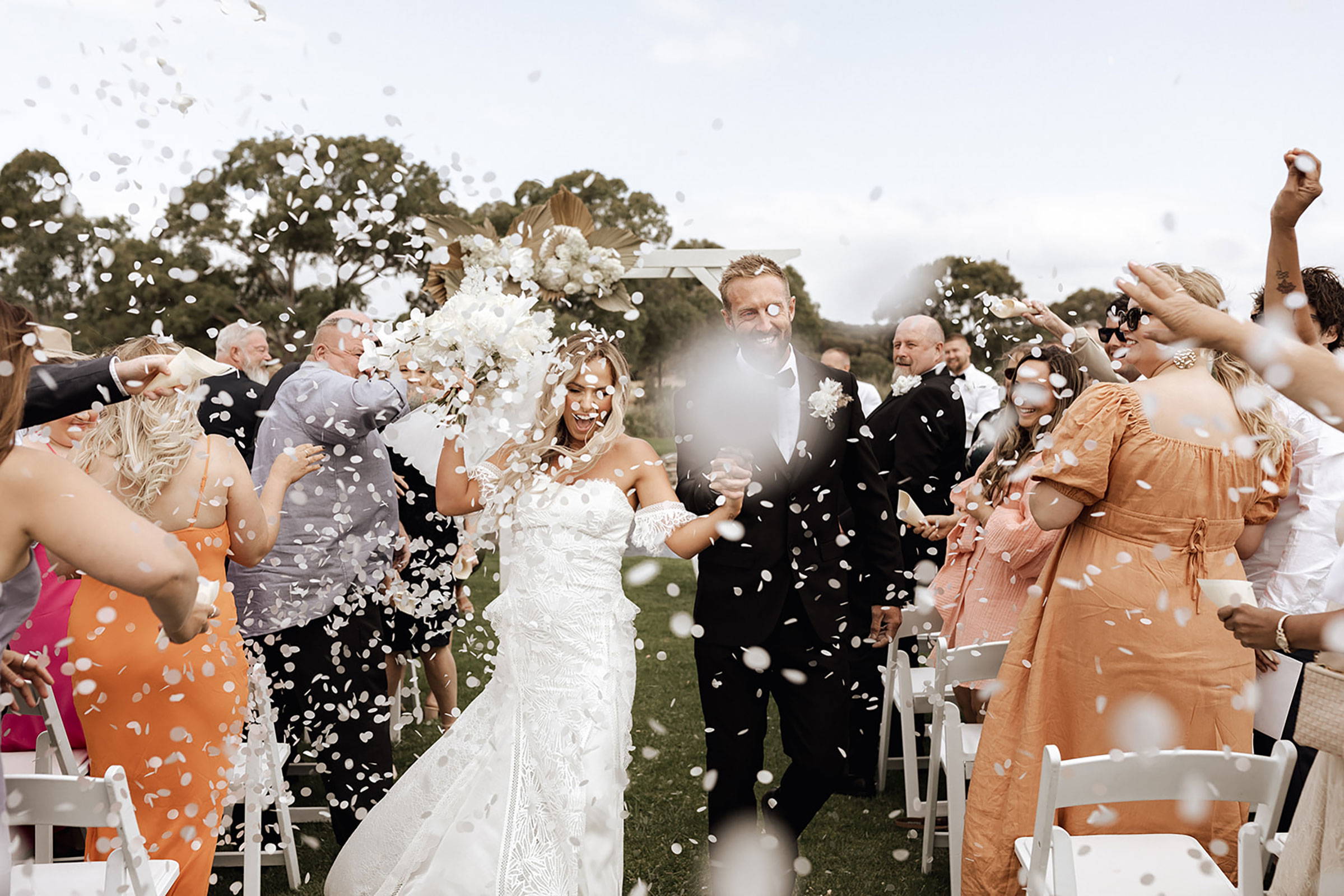 Bride and groom walking down aisle