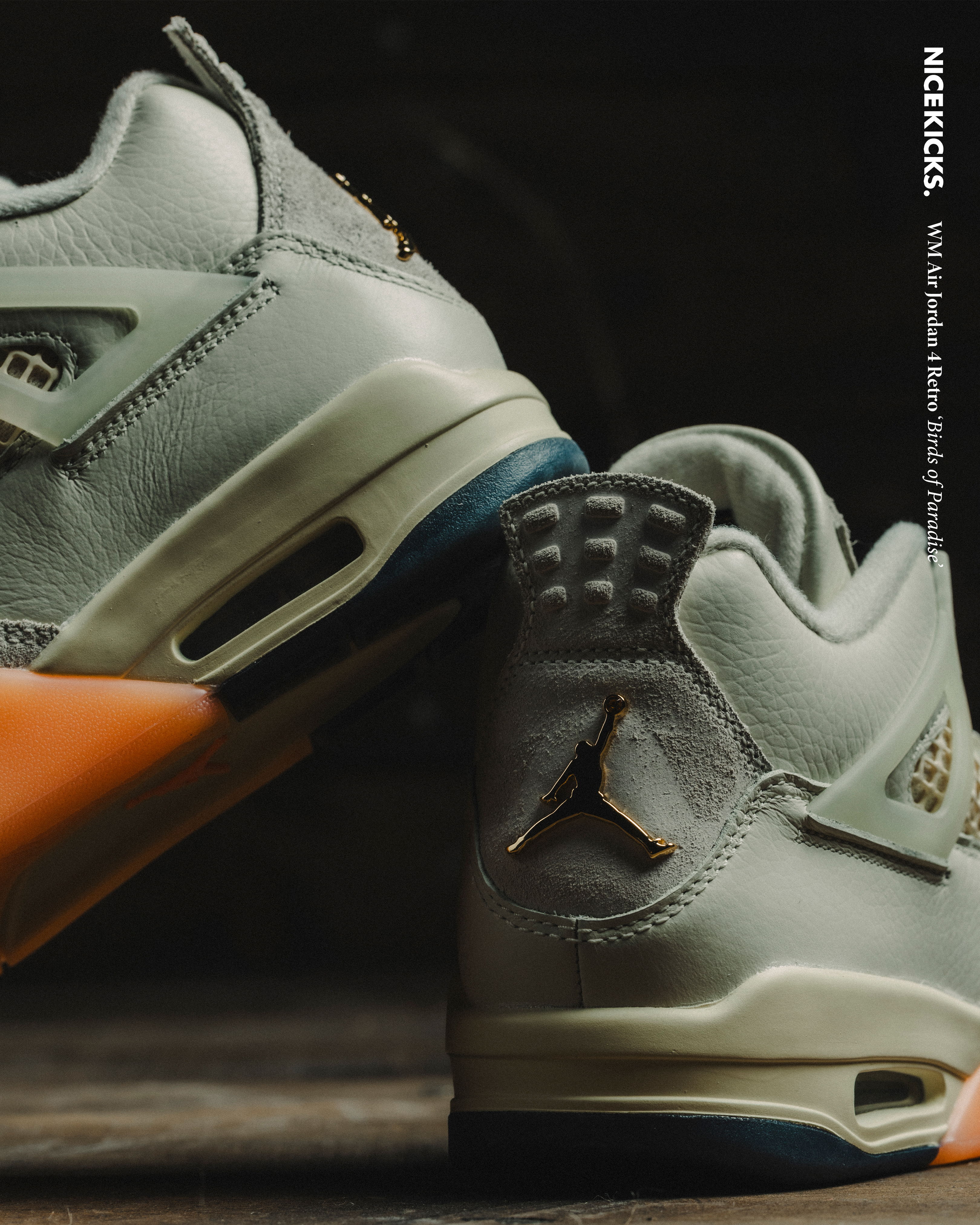 A pair of Air Jordan 4 sneakers in light colors.
