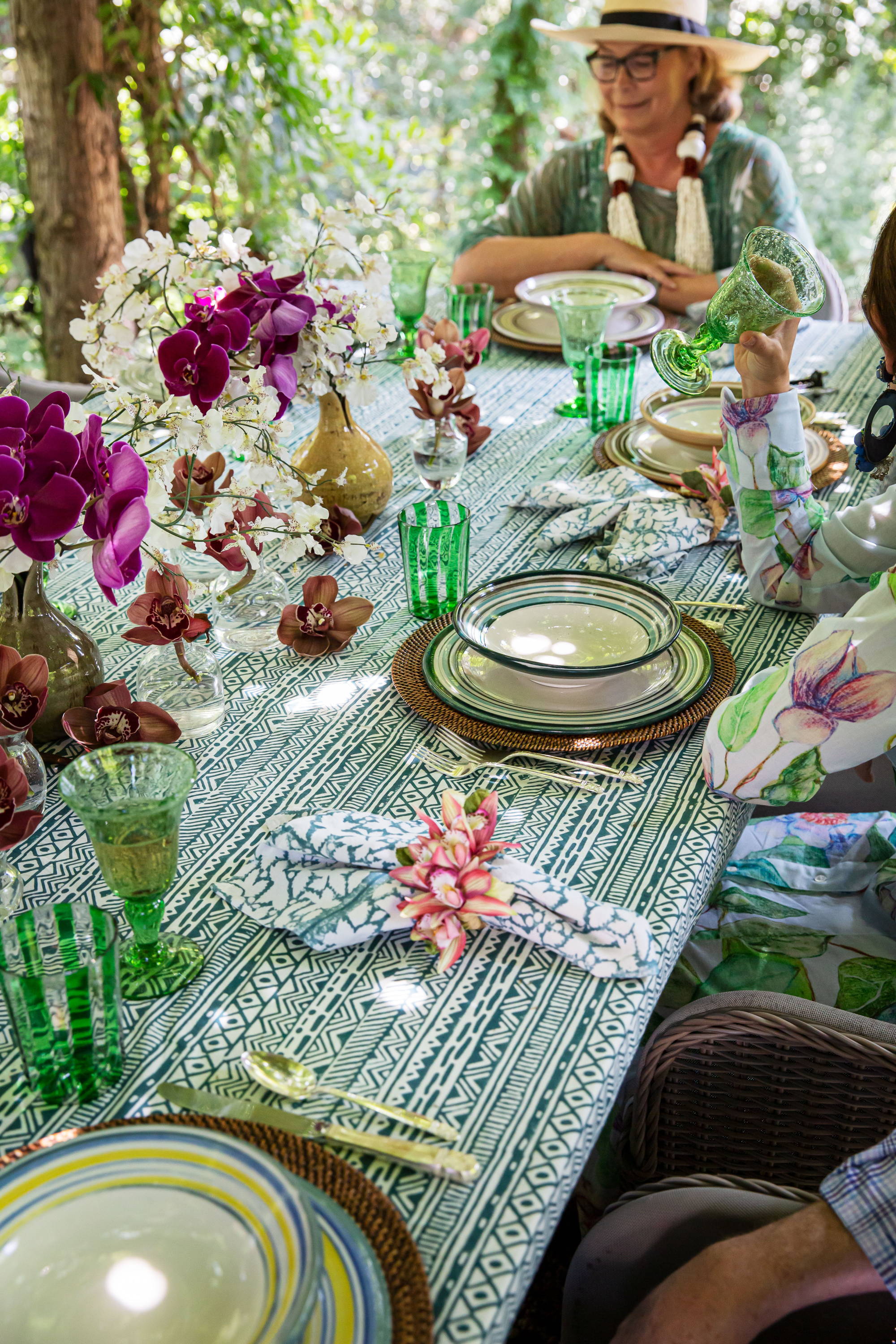 Ala Isham sitting at a tablescape