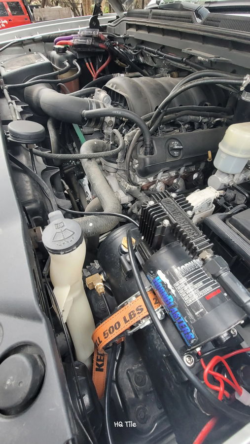 Shocker Mini Outlaw 127H Train Horn Kit hardware staged on Jerry's GMC Sierra SLT photo 2