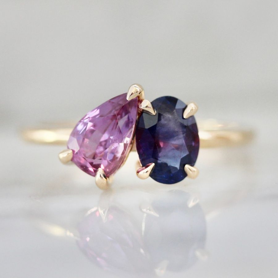 ready to ship engagement ring with pear cut pink sapphire and oval cut purple sapphire in toi et moi design